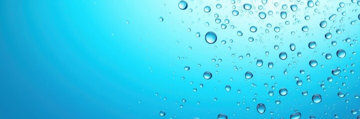 A serene and refreshing background of aqua blue water droplets, perfect for designs related to healthcare, relaxation, nature, and cleanliness.