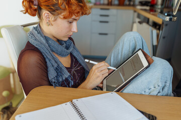 Woman using tablet, e-learning