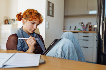 Woman using tablet, e-learning