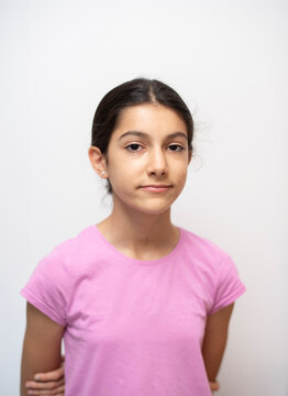 11-year-old girl looking at the camera for a simple and natural portrait