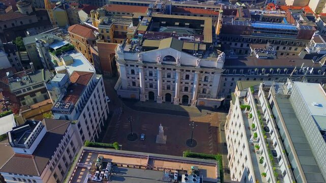 Aerial view of the Borsa Piazza Affari. houses in the city. Attractions for tourists. A crisis. Statue of the middle finger on the hand. Finance. Architecture. Italy, Milan, 26.09.2025