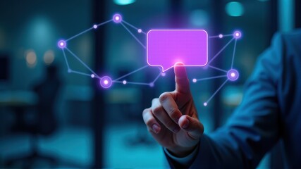 A finger touches a glowing digital speech bubble, symbolizing communication and connectivity in a futuristic network environment.
