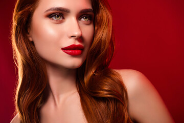 Fototapeta premium Photo of pretty stunning girl look empty space make up model shoulders off isolated on red color background