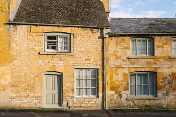 Autumnal English Village with Limestone Cottages and Autumn Trees - Quintessential Filming Location for Father Brown in Blockley, Gloucestershire in The Cotswolds