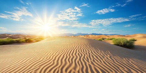 Naklejka premium Breathtaking view of golden sand dunes under a bright blue sky with sun rays illuminating the serene desert landscape.