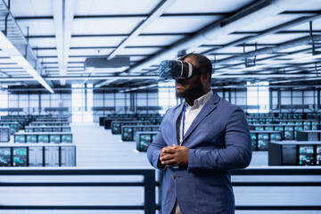 Engineer in data center implementing backup solutions to protect against data loss using VR...