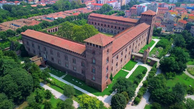Drone view of the city with the cathedral and the castle of the Visconti dynasty and the museum, archaeological finds. City of a hundred towers historical medieval architecture. Italy Pavia 22.04.2025