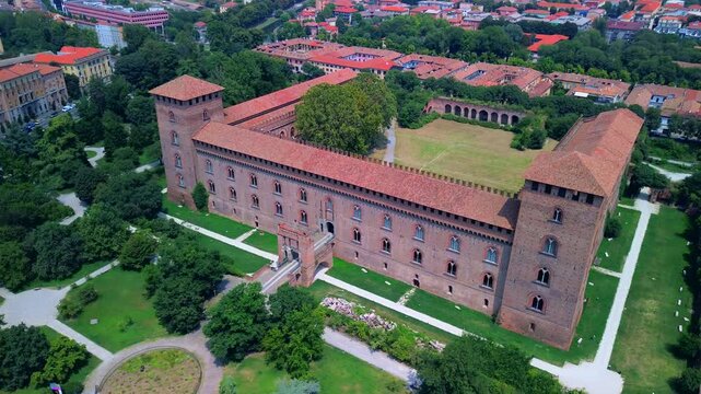 Drone view of the city with the cathedral and the castle of the Visconti dynasty and the museum, archaeological finds. City of a hundred towers historical medieval architecture. Italy Pavia 22.04.2025