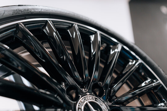 Photo of a Mercedes CLA 2024 in detailing studio. They show details of the car from the outside and inside. The photo is suitable for use in marketing materials, advertisements or press articles.