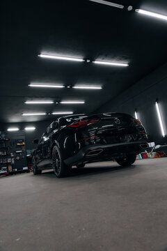 Photo of a Mercedes CLA 2024 in detailing studio. They show details of the car from the outside and inside. The photo is suitable for use in marketing materials, advertisements or press articles.