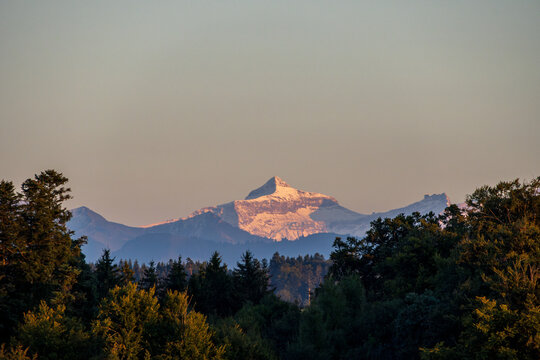 Majestic Moonset over Swiss Alps in Estavayer le Lac