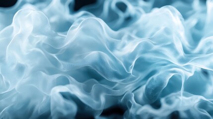 Obraz premium A breathtaking image of blue wispy smoke-like clouds, creating a dreamy and ethereal effect with intricate patterns, perfect for artistic and surreal themes.