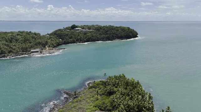 Drone flies over Alfred Dreyfus Prison on Devil's Island toward Royal Island in the Salvation Islands, near Kourou, French Guiana, France