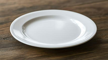White plate isolated on a wooden table