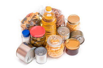 Food Reserves: Canned Food, Spaghetti, Pate, Tuna, Tomato Juice, Pasta, Fish and Grocery - Isolated on White Background. Emergency Food Storage in Case of Crisis. Strategic Food Supplies - Isolation