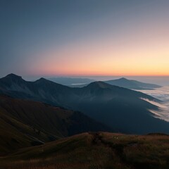 Serene sunrise over a misty mountain range