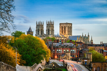 Fototapeta premium The city of York in England with its medieval wall and the York Minster at sunset