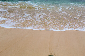 View of the waves washing the beach