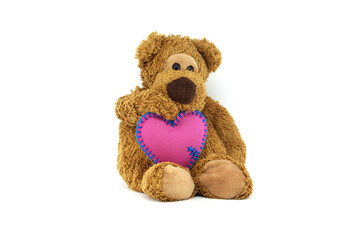 Cute Teddy Bear Holding a Heart-Shaped Pillow