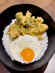 Crispy Chicken with Salted Egg Yolk Sauce. Made from bite-sized chicken fillets, wrapped in flour, fried, covered with salted egg yolk seasoning with spices