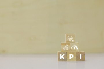 KPI - Business concept word on wooden puzzle