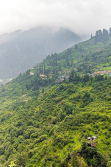 Small villages and colorful local houses nested in the hills of Parvati valley at manikaran, himachal pradesh, India.