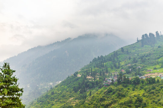 Small villages and colorful local houses nested in the hills of Parvati valley at manikaran, himachal pradesh, India.