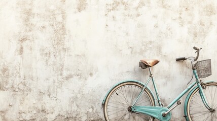 Vintage bicycle with basket against weathered wall