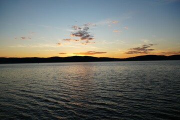Obraz premium sunset over the river