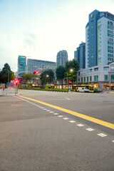 Fototapeta premium Asphalt Road and City Street With Modern Building