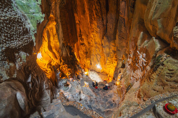 interior of Vietnamese sacred Buddhist temple inside the Am Phu Cave in the Marble Mountains in Da...