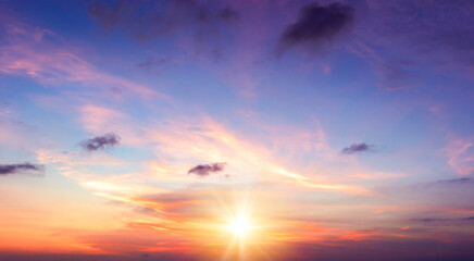 Sunset sky background. Panoramic view of beautiful sunset sky