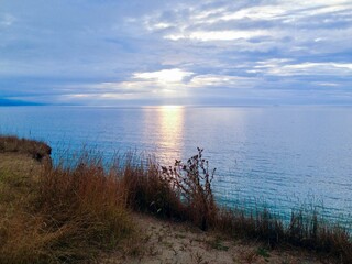 Tranquil Summer Coastline at Dusk: Serene Seascape and Colorful Sky