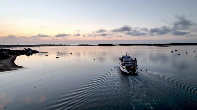 Ferry boat departs at sunrise from Hyannisport, Hyannis Port Massachusetts