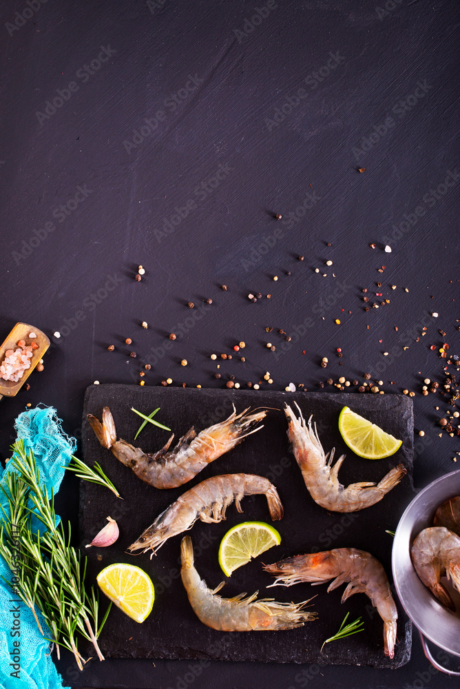 Poster fresh tiger Prawns, shrimp seafood with lemon and spices.