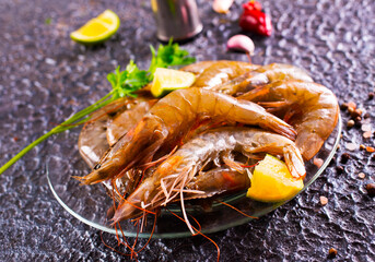 Top view of raw fresh shrimps with lemon