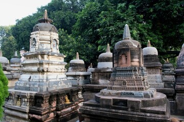 ancient dome like conical relic structures or buddhist 'stupas' present at mahabodhi temple site at...