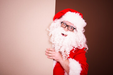 Funny Santa Claus collects gifts.