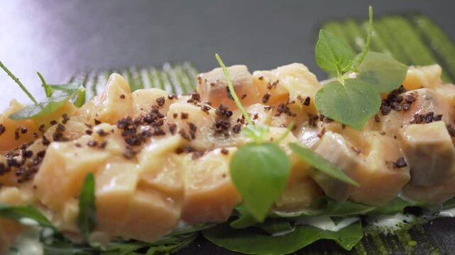 Food on a round table - Salmone Tartare - close up
