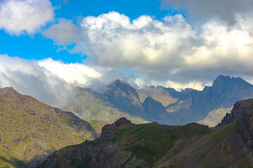 Mountain range and clouds. Landscape of the mountains