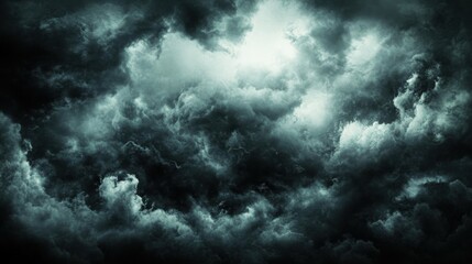 Cloudy sky with a mix of white and dark clouds, some sun rays peeking through, dynamic and moody, ideal for dramatic stock backgrounds,