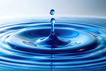 Blue liquid slowly drips, creating gentle ripples on a pristine white background, with a soft shadow adding depth and realism., ripple effect, motion, splash