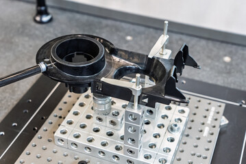 3D coordinate measuring machine. 3d precision measurement on machine quality control parts. Measuring machine for finished parts after cnc machining. Measuring machine.