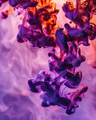 Macro Shot of Violet and Amber Ink Forming Smoky Patterns in Water
