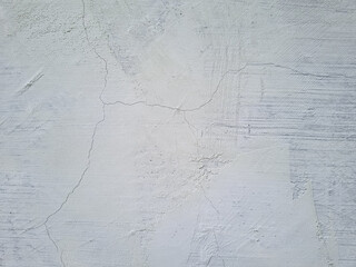 White wall texture background with thin layer of paint, paper texture background