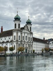Obraz premium Lucerne, Switzerland, Chapel Bridge, Kapellbrücke, Lake Lucerne, Swiss landmark, European city, Reuss River, Lucerne old town, Swiss architecture