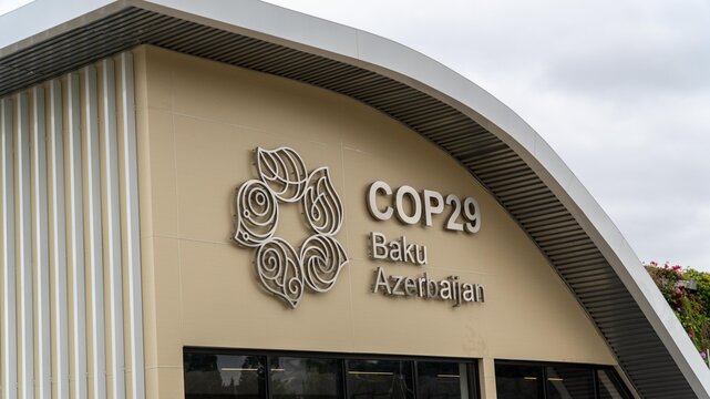 Baku, Azerbaijan - 14 Oct 2024: Cop29 logo and signage on the information center building. The 2024 United Nations Climate Change Conference, known as COP29, will be held in Baku
