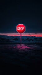 Isolated red stop sign against a dramatic sunset sky in a desolate landscape, symbolizing solitude and caution.