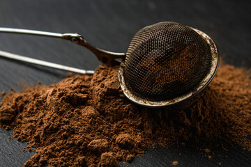 Cocoa powder on a dark background