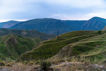Obraz premium Caucasian mountain. Dagestan. Trees, rocks, mountains, view of the green mountains. Beautiful summer landscape.